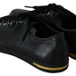 Chic Black Leather Sneakers with Gold Accents