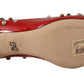 Radiant Red Patent Leather Pumps with Stud Accents