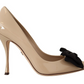 Beige Patent Leather Pumps with Black Bow