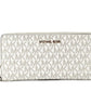 Jet Set Travel Large Vanilla Signature Continental Wristlet Wallet