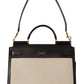 Elegant Monochrome Leather and Canvas Bag