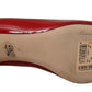Elegant Patent Leather Heels with Chic Bow Accent