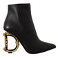 Elegant Black Leather Ankle Boots with Logo Heels