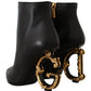 Elegant Black Leather Ankle Boots with Gold Detailing