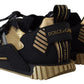 Elegant Black and Gold NS1 Sneakers