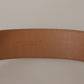 Elegant Beige Leather Belt with Engraved Buckle