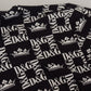 Elegant Black Crown Print Polo Tee