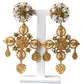 Elegant Gold Tone Madonna Floral Earrings
