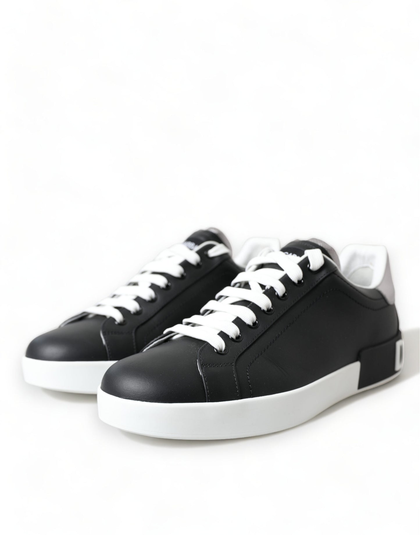 Elegant Black and White Leather Low-Top Sneakers
