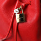 Elegant Red Leather Drawstring Bag with Gold Detailing