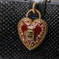Elegant Black Leather Box Clutch with Gold Details