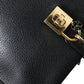 Elegant Black Leather Shoulder Bag with Gold Accents
