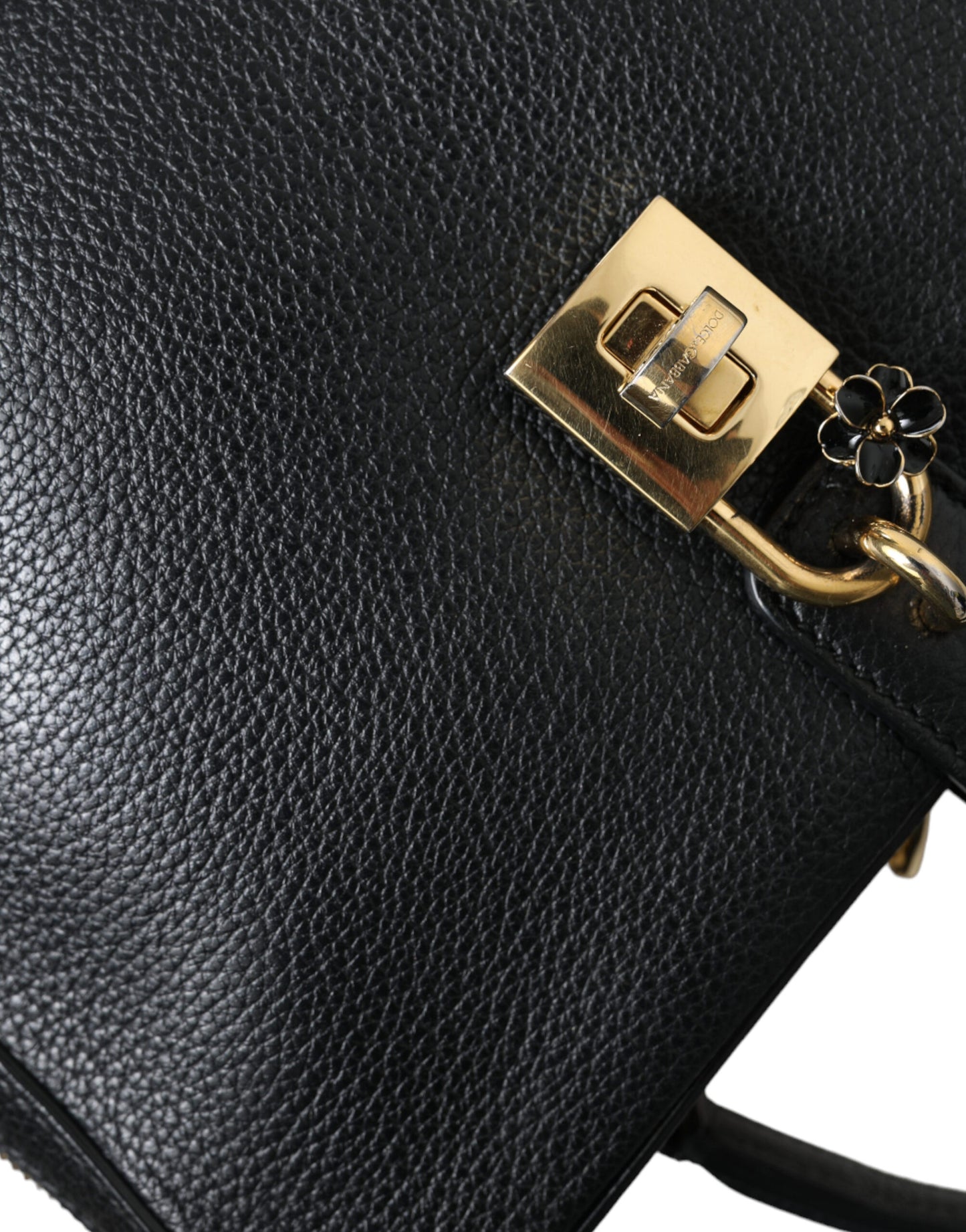 Elegant Black Leather Shoulder Bag with Gold Accents
