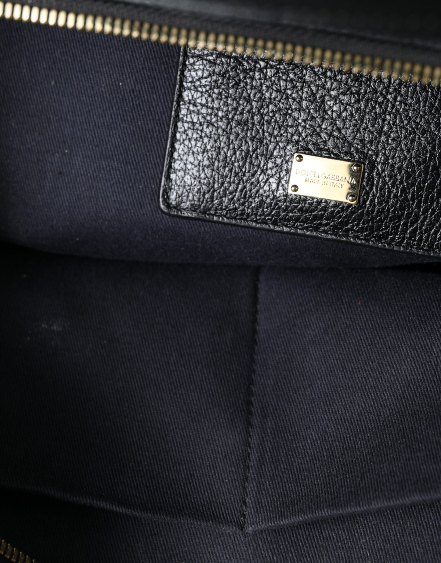 Elegant Black Leather Shoulder Bag with Gold Accents