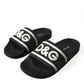 Chic Logo-Embossed Black Slides for Elegant Comfort