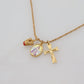 Elegant Gold Tone Charm Necklace with Cross Pendant