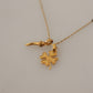 Elegant Gold Tone Clover Charm Necklace