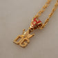 Gold Tone Brass Logo Charm Necklace