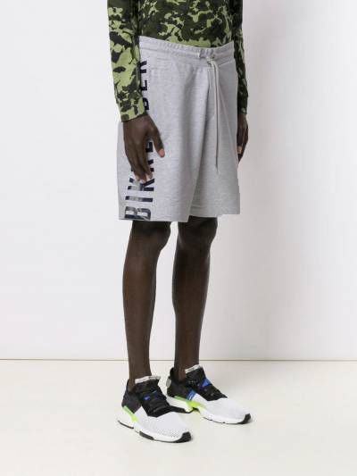 Chic Gray Bermuda Shorts with Unique Rubber Prints